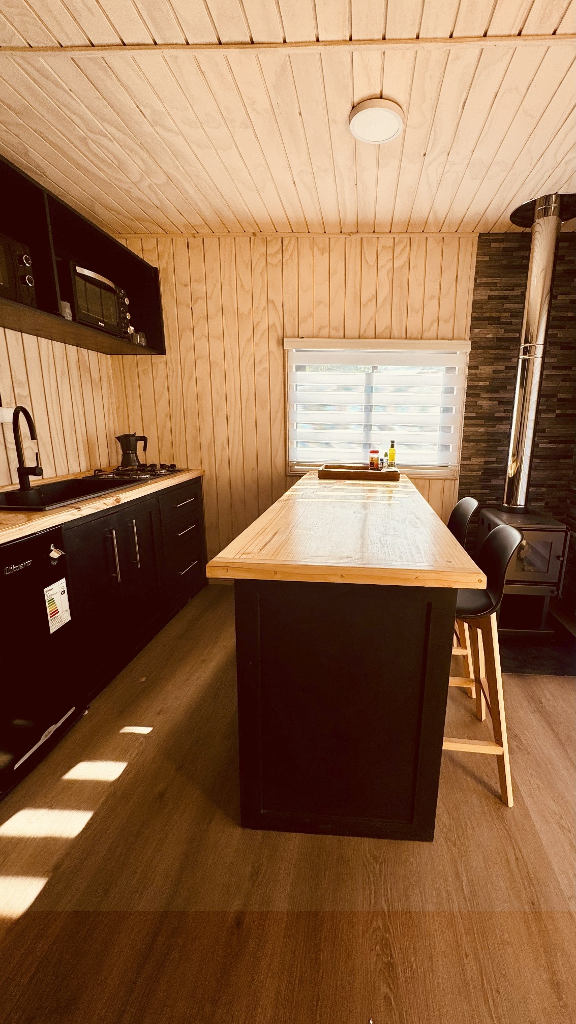 cocina y estar aurora loft pucon